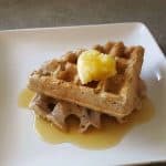 waffles on white plate with ghee and syrup
