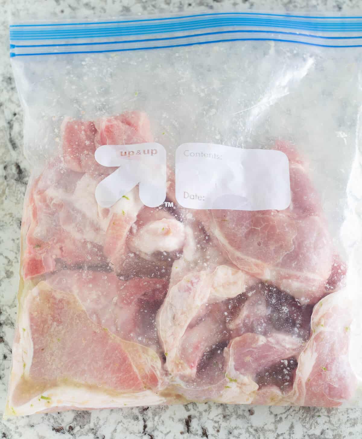 pork chops marinating in baggie