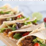 pinnable image of paleo shredded beef tacos with text