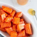 pinnable image of paleo honey glazed carrots