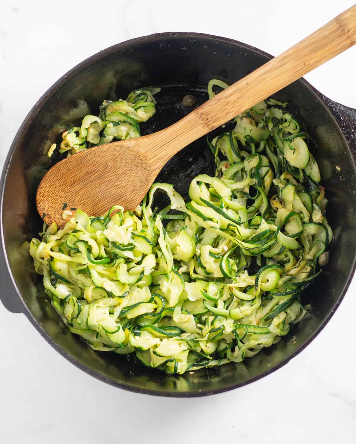 zucchini noodles in cast iron skillet