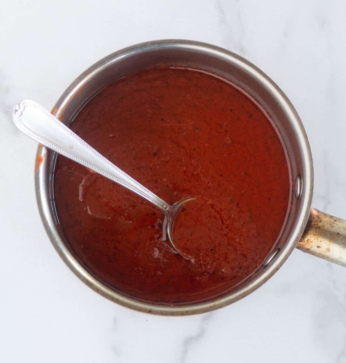 melted bbq sauce and butter in saucepan