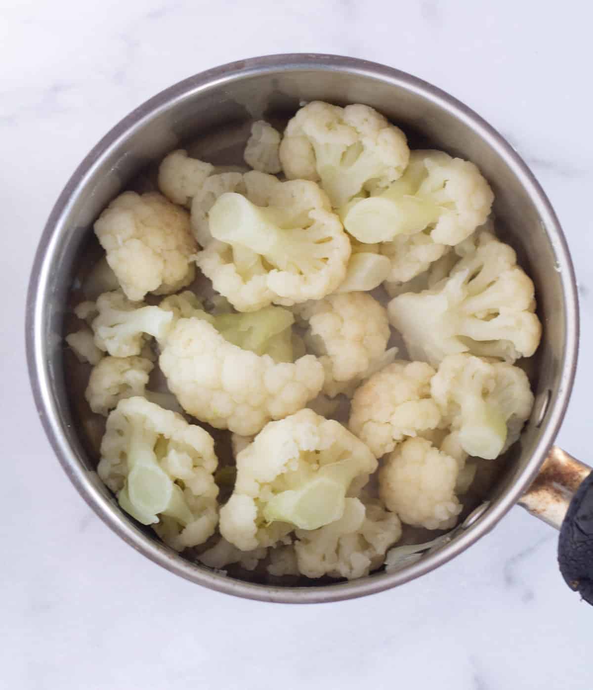 boiled cauliflower in large pot.