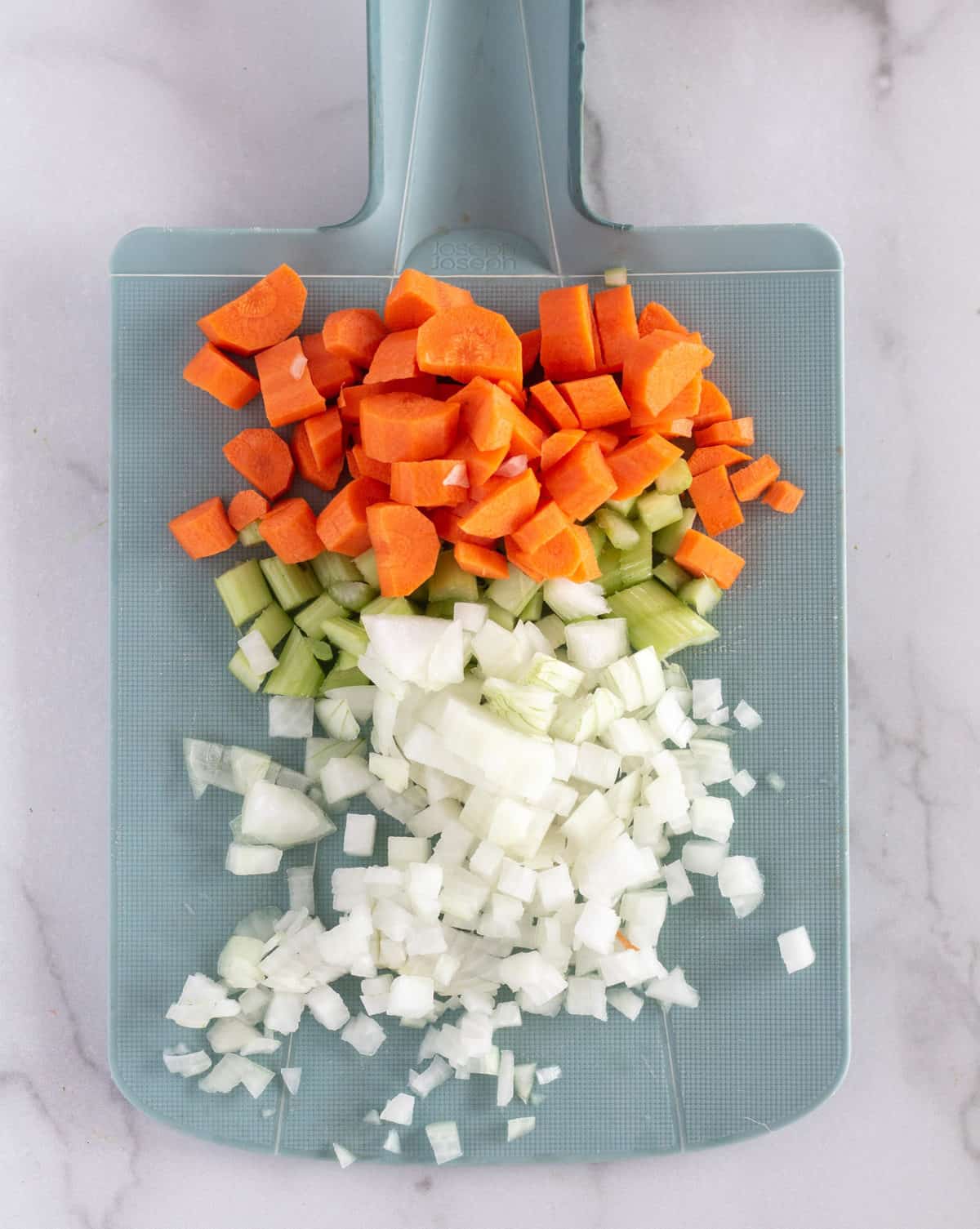 chopped veggies on cutting board