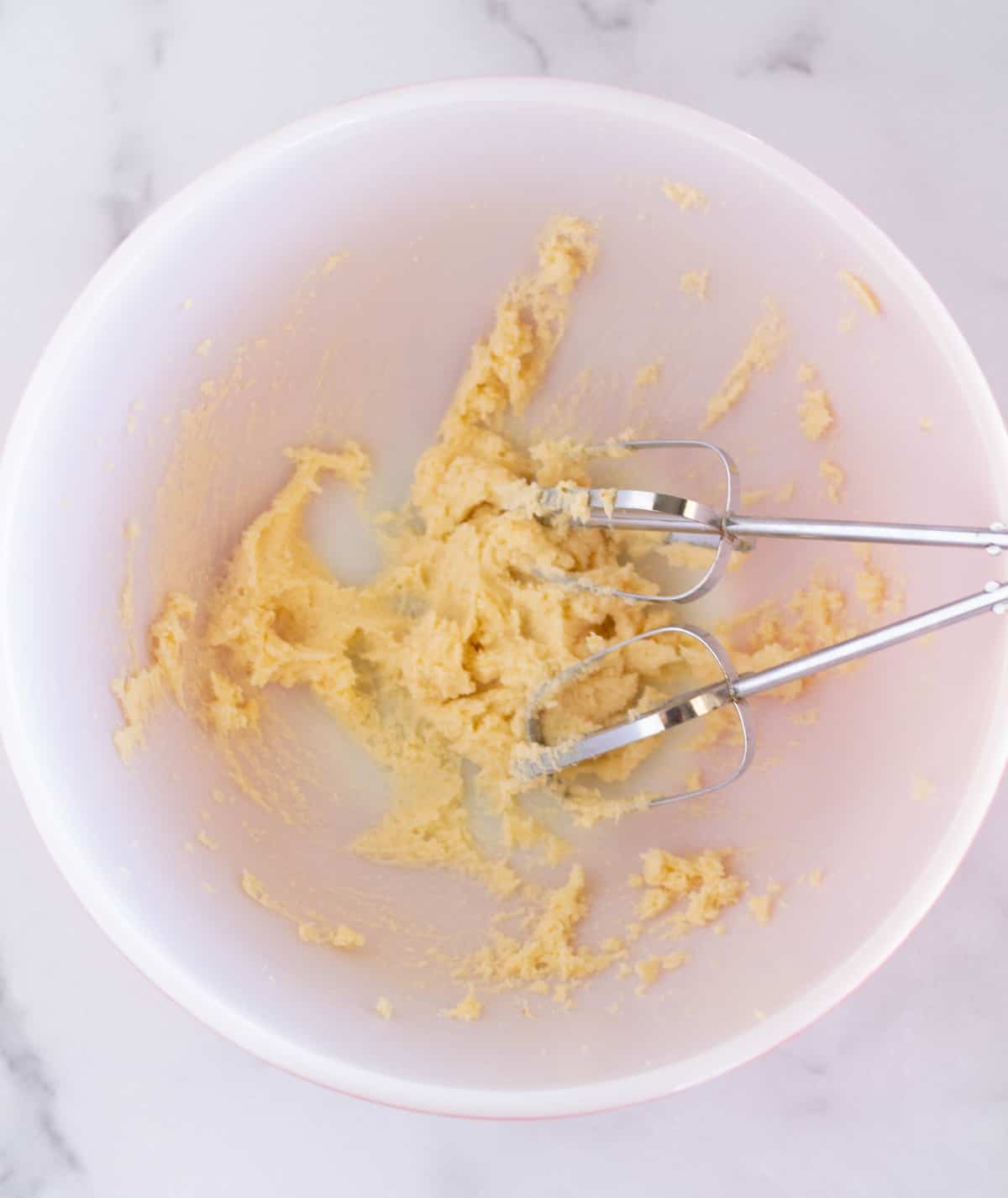 creamed butter and sweetener in bowl
