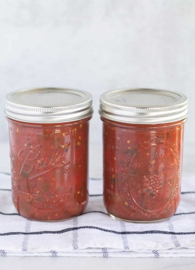 2 mason jars filled with salsa