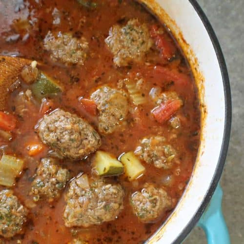 Overhead shot of meatball soup in a pot