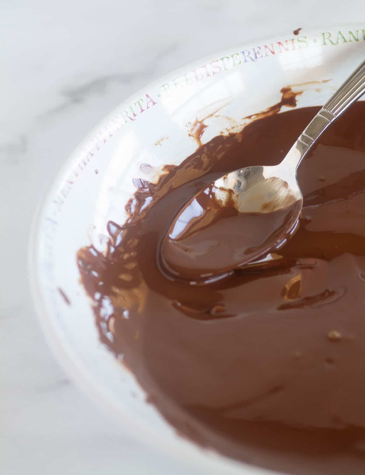 melted chocolate in a white bowl.