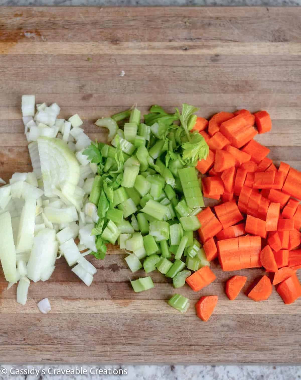chopped veggies on cutting board.