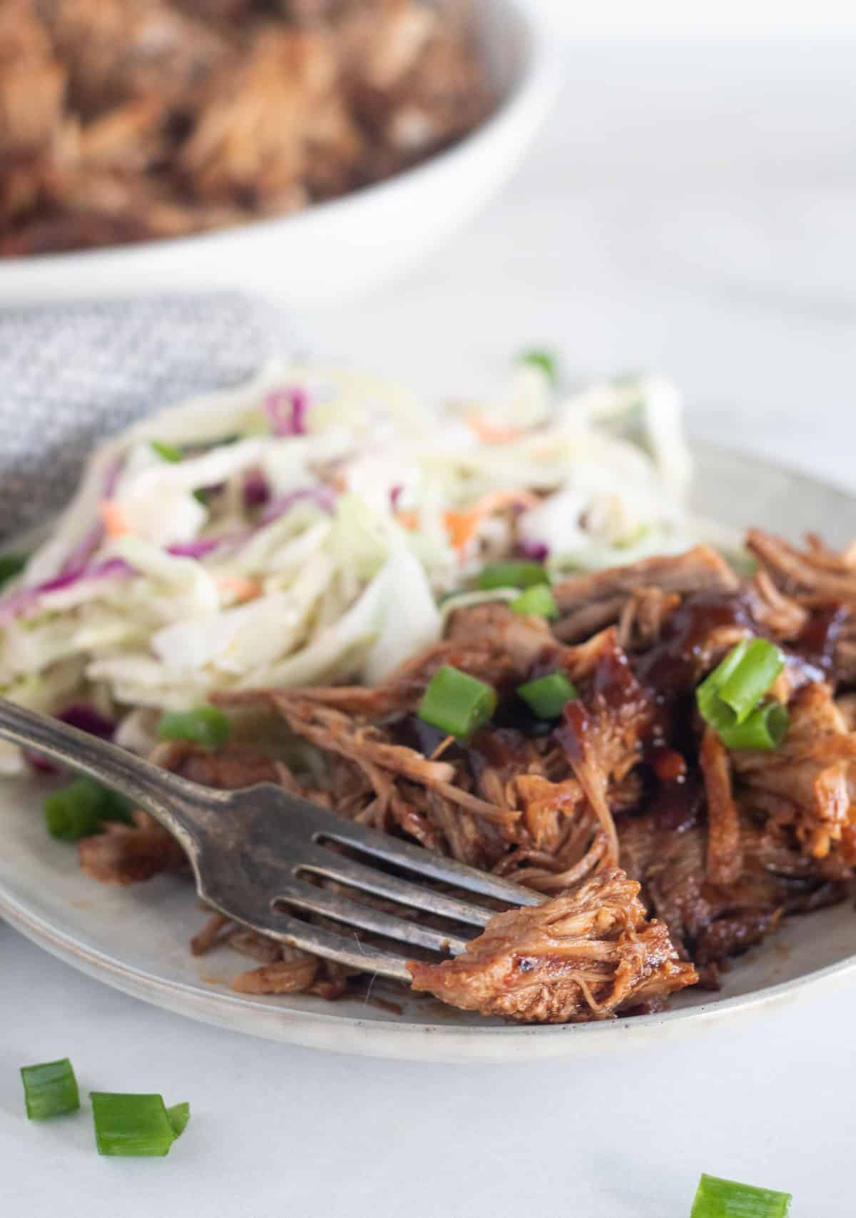 close up of pulled pork on a plate