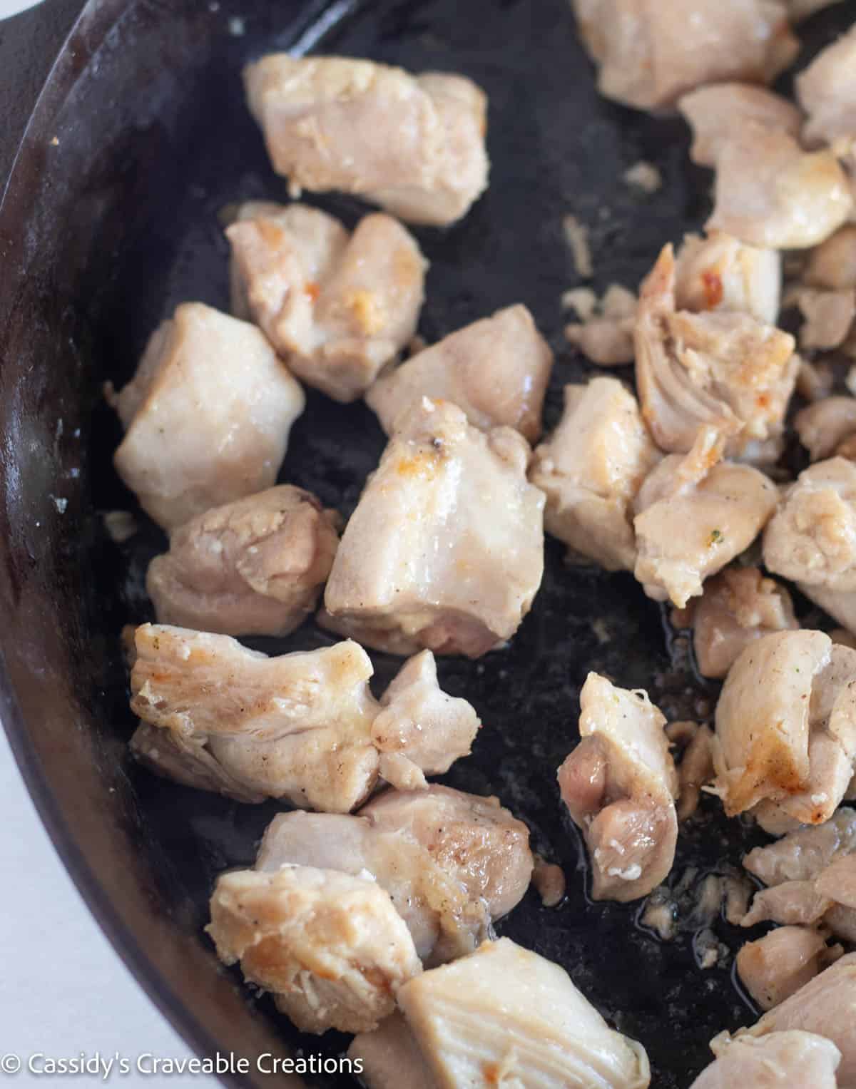browned chicken in skillet.