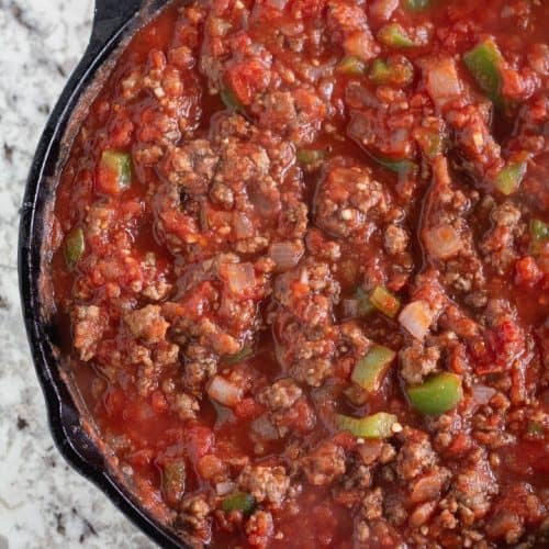 close up of keto meat sauce in cast iron skillet