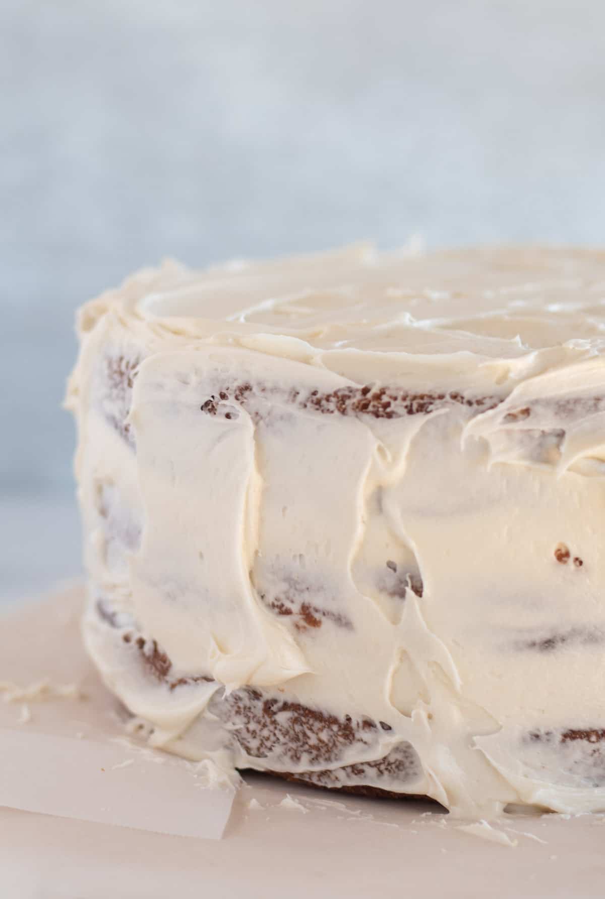 messy frosting all around cake