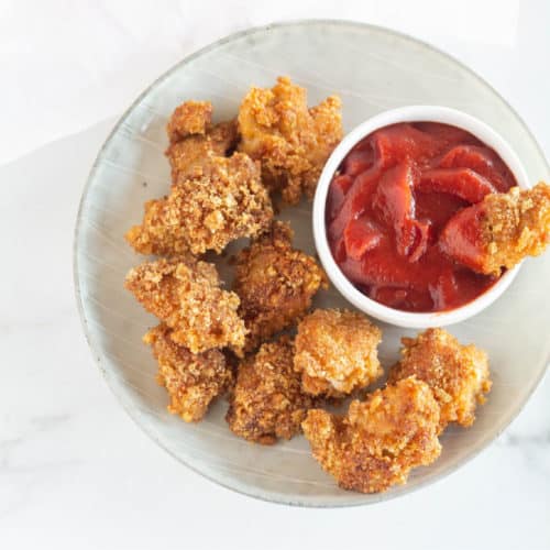 overhead shot of paleo, whole30 and keto chicken nuggets with ketchup