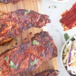 country style ribs lined up on cutting board