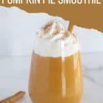 photo of pumpkin pie smoothie in a glass with the title of the recipe at the top.