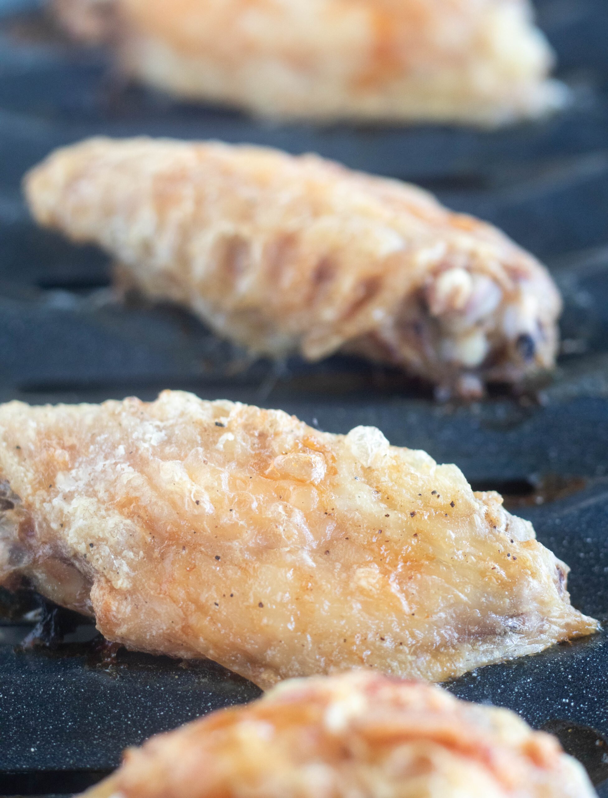 crispy baked wings on a broiler pan