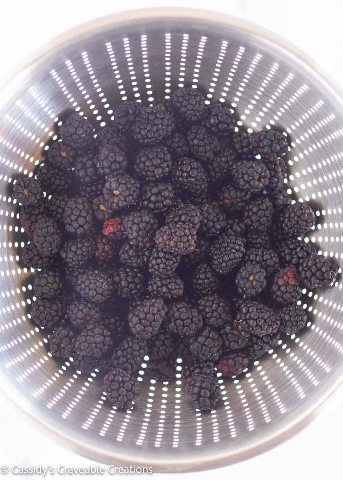 blackberries in a collander