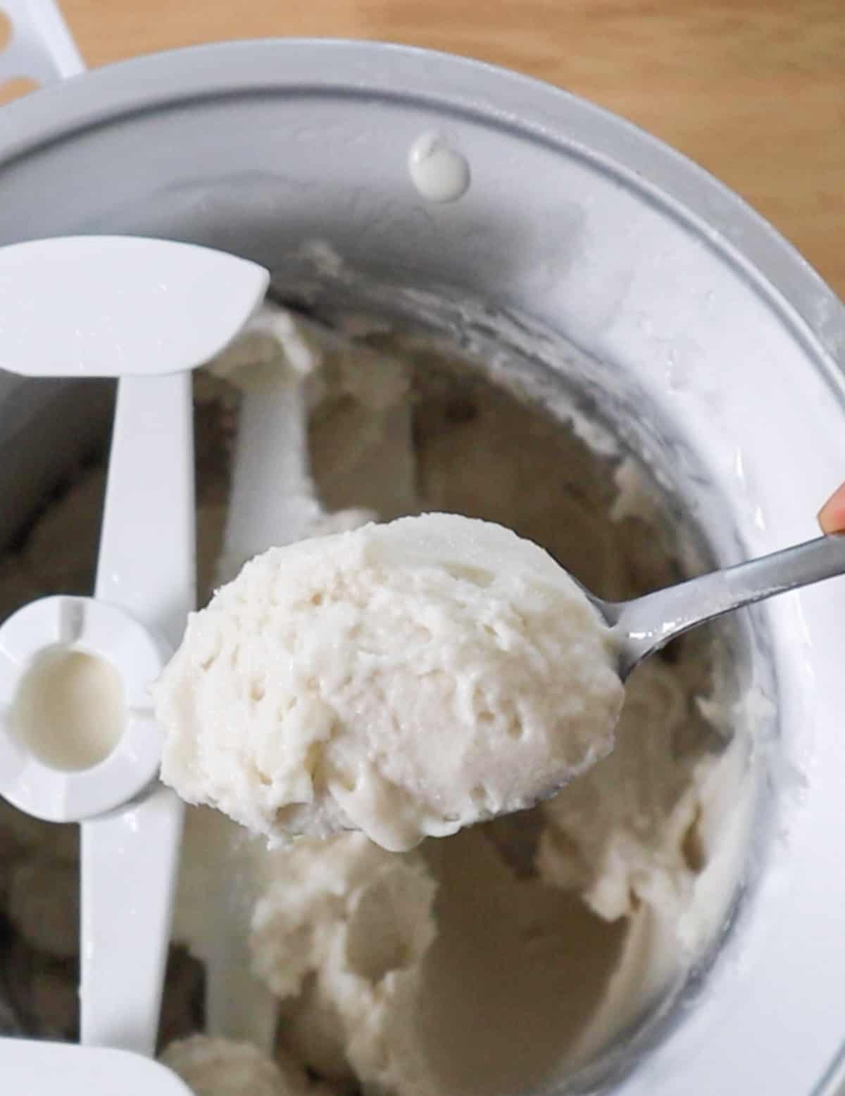 scopping freshly churned ice cream.