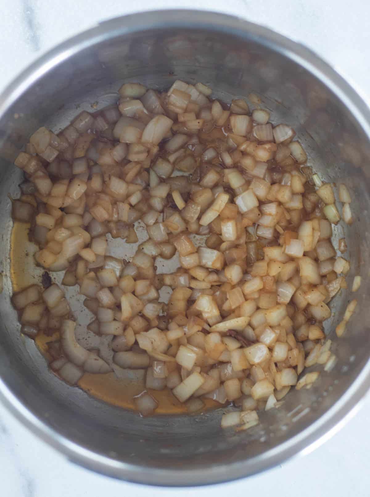 sauteed onion in bowl of instant pot