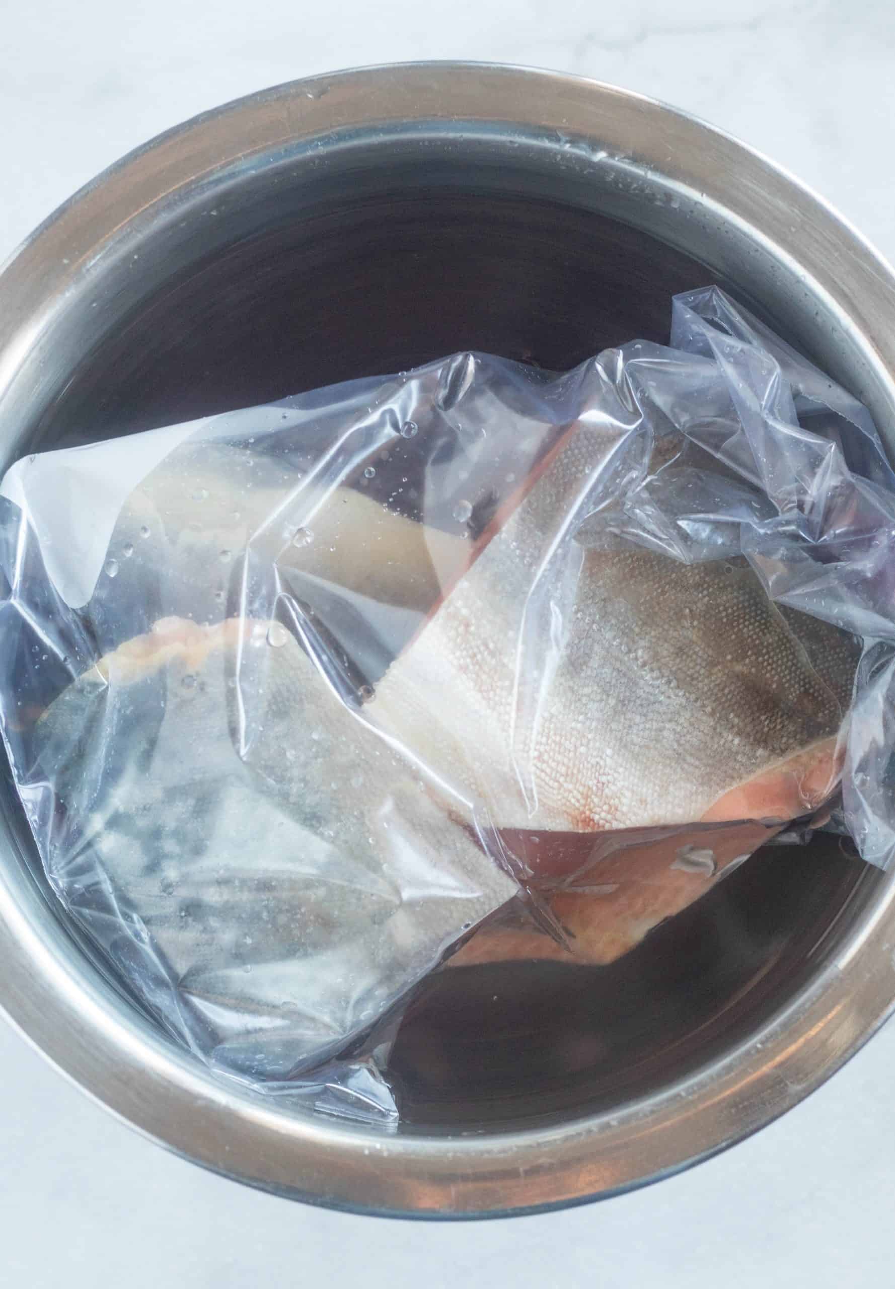 thawing salmon in cold water