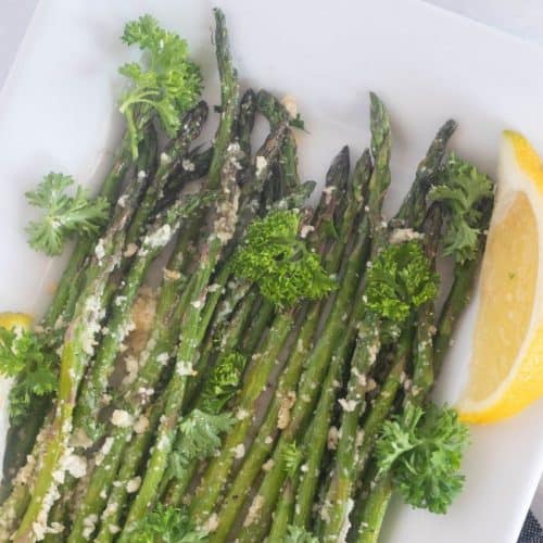 asparagus on plate with lemon