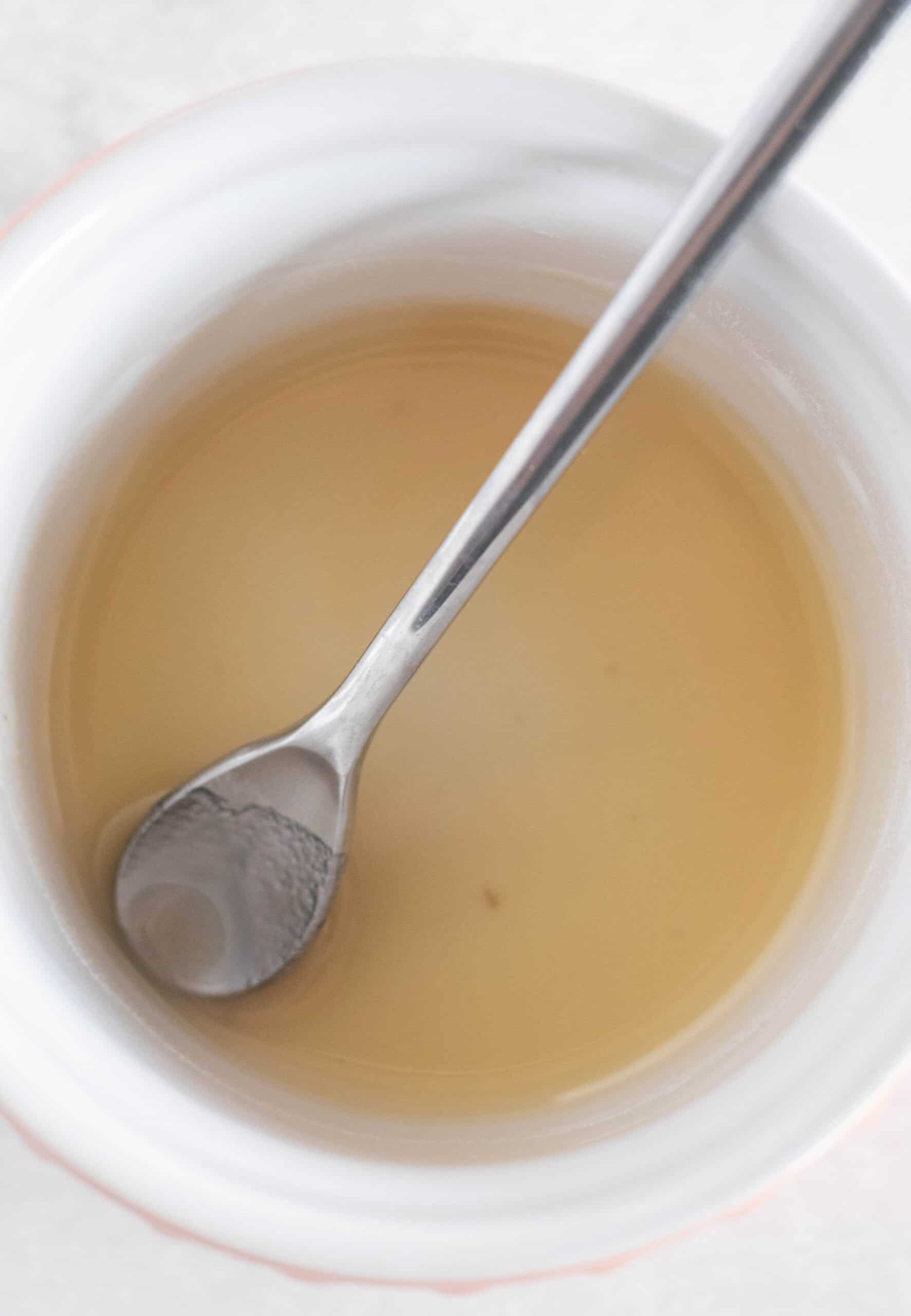 xanthan gum and oil mixed in a small bowl