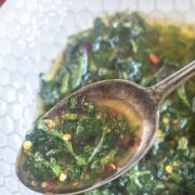 close up of chimmichurri sauce on a spoon
