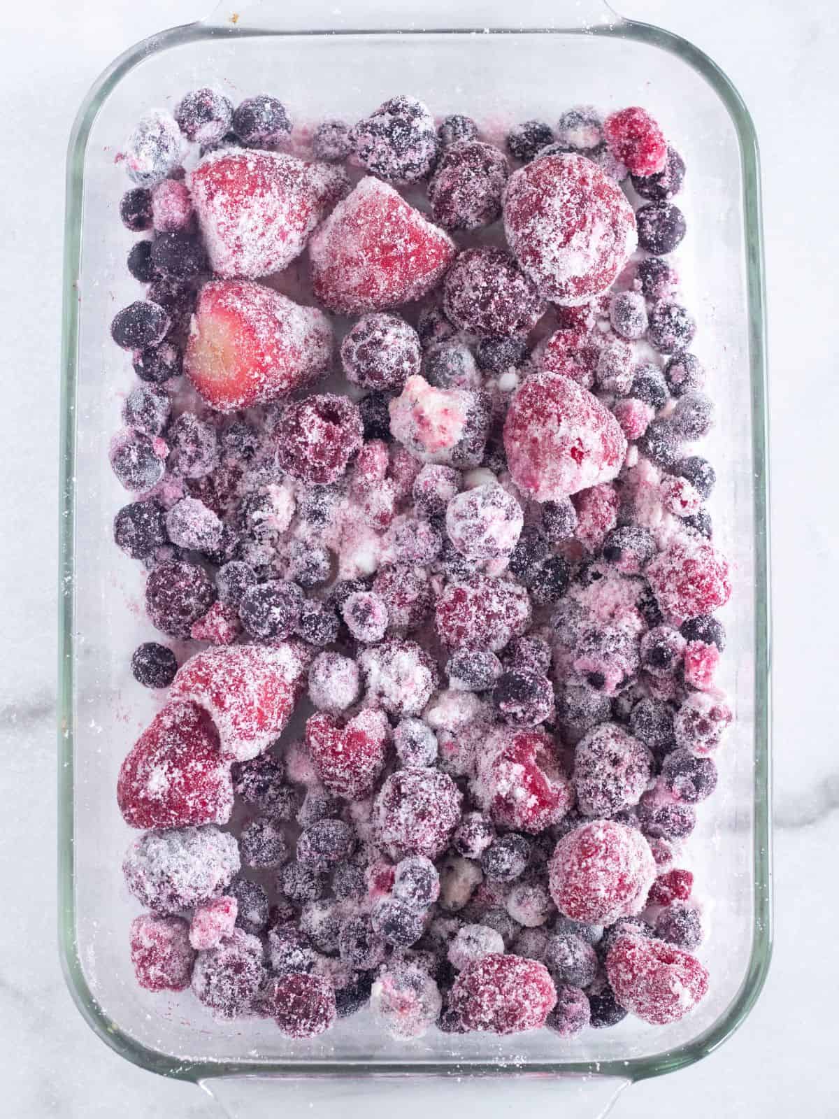 berry filling in a glass baking dish.