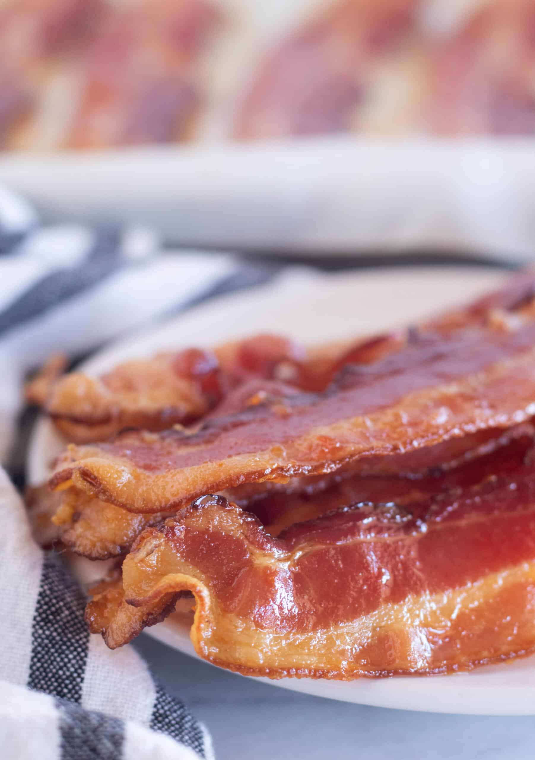 close up of cooked bacon on a plate